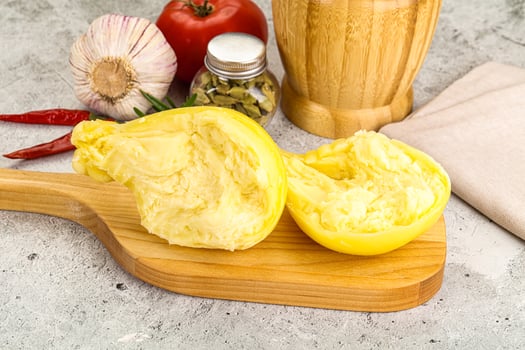 Italian traditional yellow Scamorza cheese photo