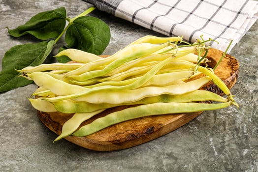 Raw green bean strings heap photo