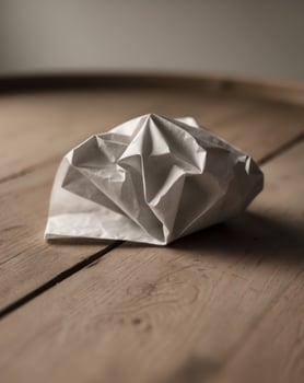 Close up of kitchen paper on wooden table background. photo