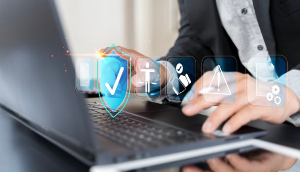Compliance in business concept. Person use laptop with compliance icon on virtual screen photo