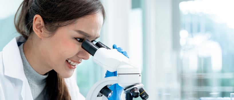 Scientist analyze biochemical samples in advanced scientific laboratory. Medical professional use microscope look microbiological developmental of viral. Biotechnology research in science lab. photo