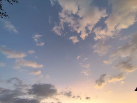 clouds in the blue sky at sunset time, beautiful nature background photo