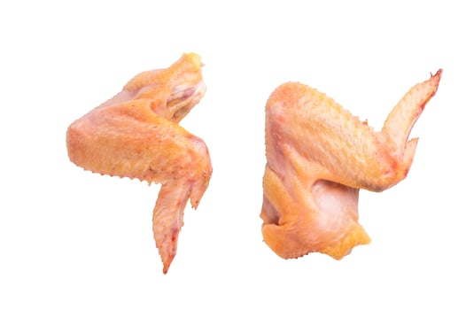 Two raw chicken wings from an eco farm are isolated on a white background, isolated on white background photo