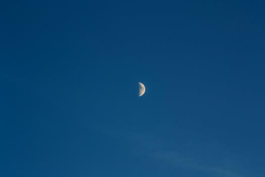 The moon in the blue sky. photo