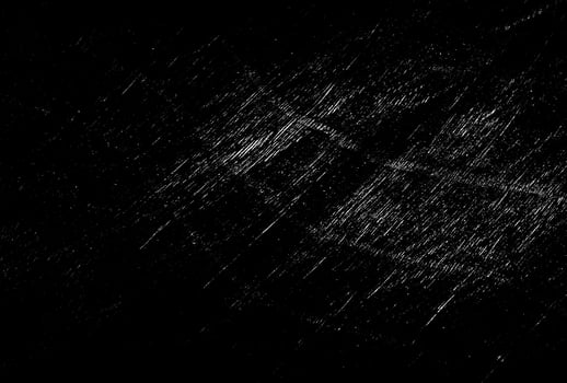 Scratch on a black background photo