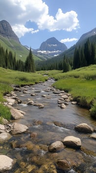 Creek winding through valley with mountain backdrop , wallpaper art photo