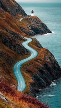 Path winding along a cliff edge toward a lighthouse , wallpaper photo