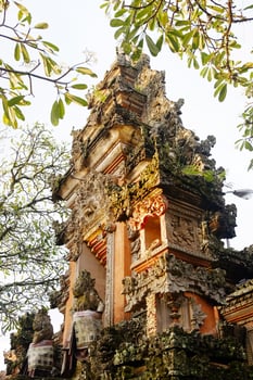 Ancient Pagoda of Portal von Taman Saraswati temple in Ubud city landmark on Bali Island of Indonesia. Travel destination for culture of Asian photo