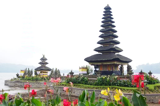 Pura Ulun Danu Bratan temple is landmark of Bali for use in Buddhist and Hindu religious ceremony located in lake and mountain on Bali island of Indonesia. Travel destination for culture of Asian photo