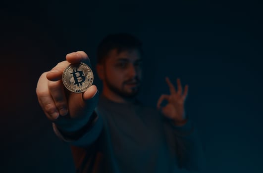 Bitcoin in your hands. New currencies of the future. photo