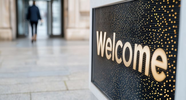 Welcoming entrance with glittering sign photo