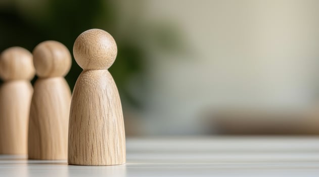 Wooden figurine on a blurred background photo