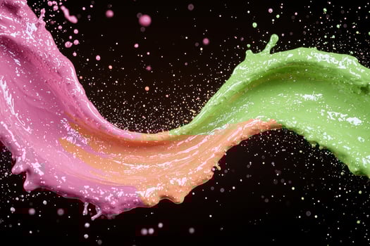 Colorful paint splash on black background photo