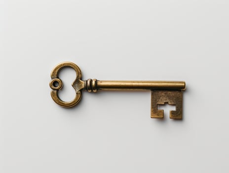Vintage brass key with cross symbol photo