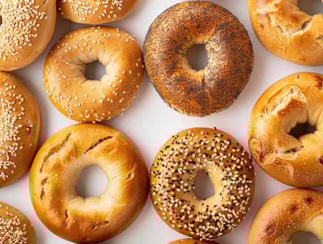 Assortment of freshly baked sesame seed bagels photo