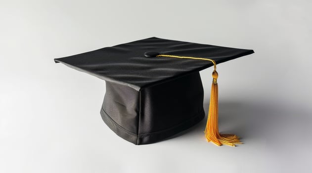 graduation cap with golden tassel photo