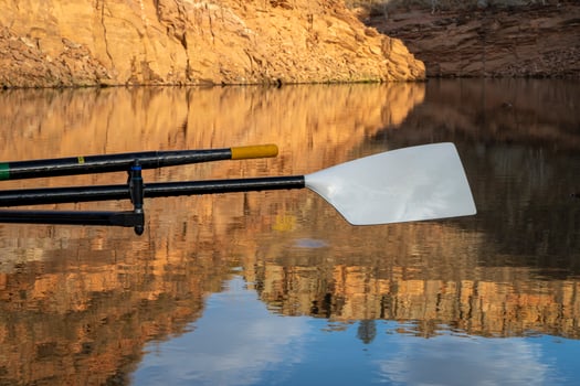 oars of coastal sculling shell in sandstone canyon of Horsetooth Reservoir in Colorado in fall scenery photo