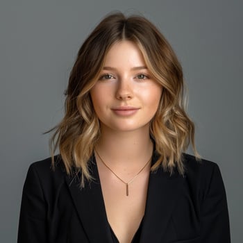 Confident young woman in black blazer photo