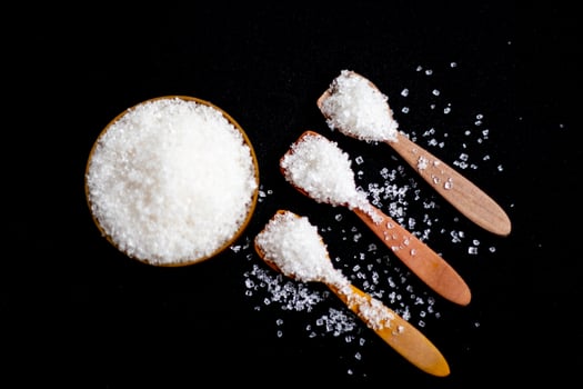 Stop sign sugar warns that too much sugar will make an unhealthy diet, obesity, diabetes, dental care and much more. photo