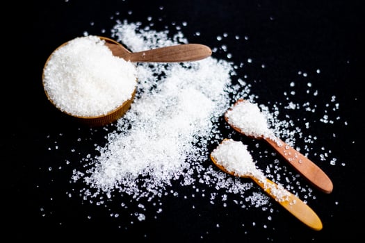 Stop sign sugar warns that too much sugar will make an unhealthy diet, obesity, diabetes, dental care and much more. photo