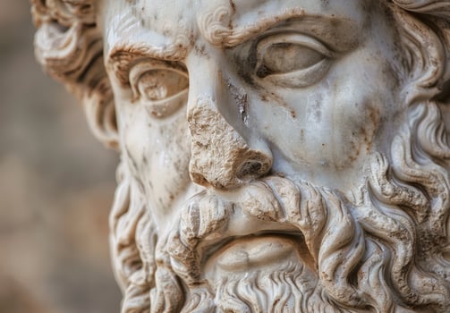 Close up of an Ancient Sculpted Face with Intricate Details photo