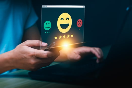 Customer Satisfaction Concept Person Using Smartphone to Leave Feedback with Positive, Neutral, Negative Emoji Options, Highlighting the Importance of Online Reviews and Ratings in Digital Business photo