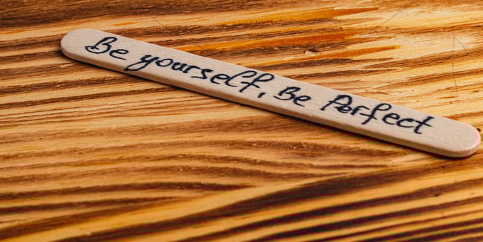 Positive thoughts for increasing selfesteem on wooden posts on wooden background photo