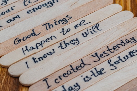 Good things, positive thoughts for self esteem on wooden sticks photo