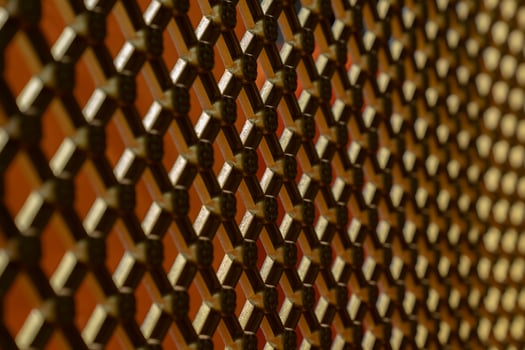 luxury Asia gold grill background with flower pattern in the cross line photo