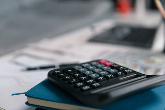 After inspecting finance documents and paperwork, he carefully calculated each tax deduction before filing, hoping for substantial refund on his income. interest, manager, pay, plan, preparation, irs photo