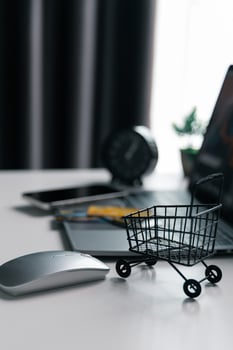 Effective marketing in e-business drives commerce by encouraging online shopping, where customers fill their carts and make purchases during sales, all within vast expanse of cyberspace. idea, pay photo