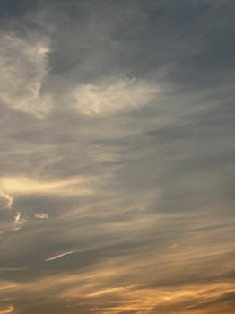 Fiery Sunset over a Silhouetted Landscape photo