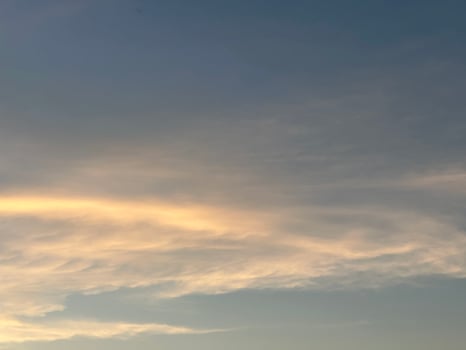 Fiery Sunset over a Silhouetted Landscape photo