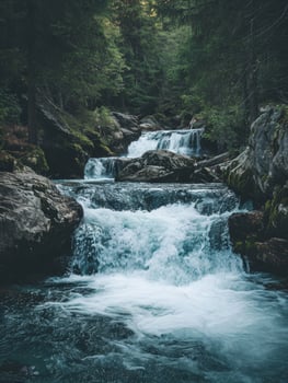 Serene Waterfall in a Lush Forest photo