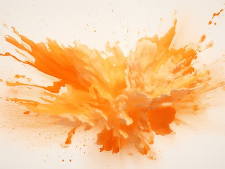 Explosion of orange paint on a white background photo
