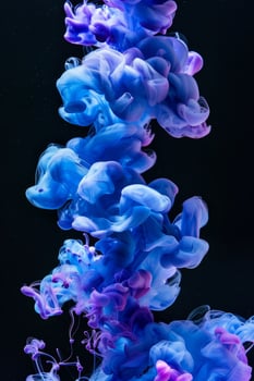 Ethereal Blue and Purple Ink Clouds in Water photo