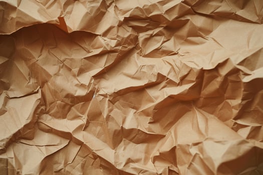Close up of crumpled brown paper texture photo