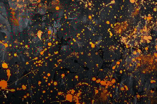 Abstract orange and black paint splatter background photo