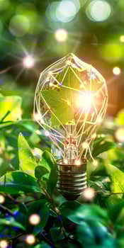 Eco Friendly Energy Concept with Light Bulb and Green Leaves photo