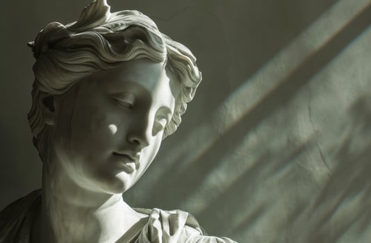 Classical sculpture with dramatic lighting photo