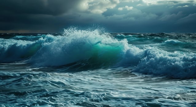 Dramatic Ocean Waves Under Stormy Skies photo