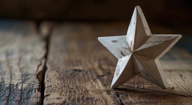 a white star on a wood surface photo