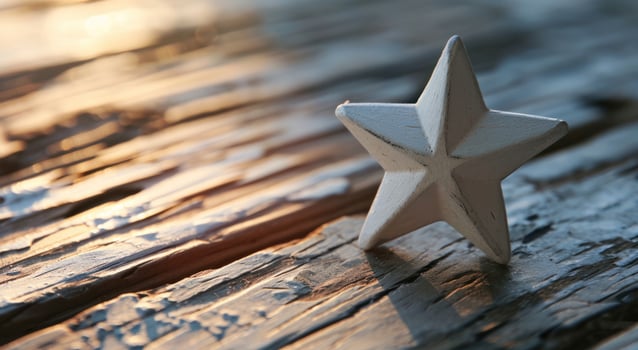 a white star on a wood surface photo