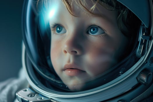 a child looking out of a space helmet photo