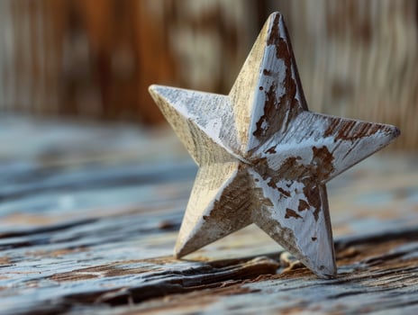 a white star on a wood surface photo