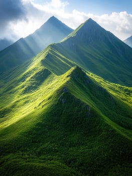 Majestic green mountain peaks under cloudy sky photo