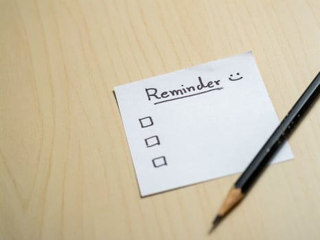 Organizing your life reminder notes on a desk home office digital tools minimalist productivity photo