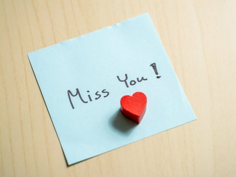 Miss you note home personal message indoor close-up sentimental gesture photo