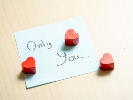 Heart-shaped tokens and sentimental notes a close-up of romantic gestures in love photo