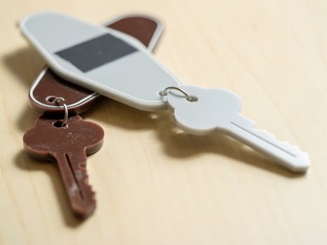 Keys on a table home close-up minimalist design indoor setting still life concept photo